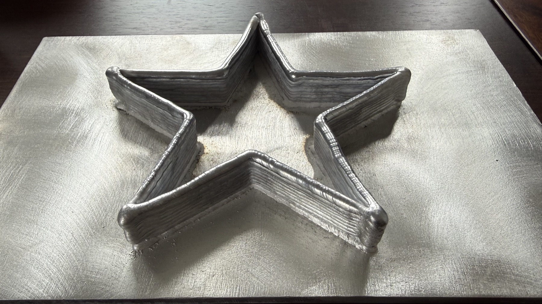 Five-point star robotic laser wire deposition training sample