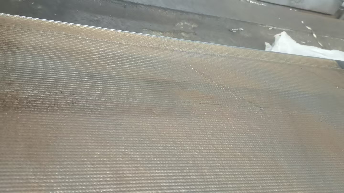 Laser wire additive repair bead pattern on a large bridge component
