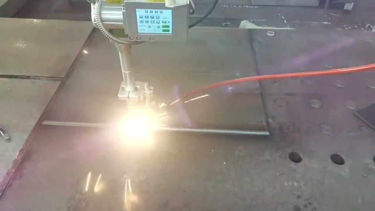 Robotic laser wire deposition on a carbon-steel bridge structure component