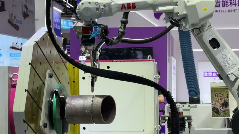 Robot welding cell for pipe and fixture validation observed at Shenzhen Essen 2026